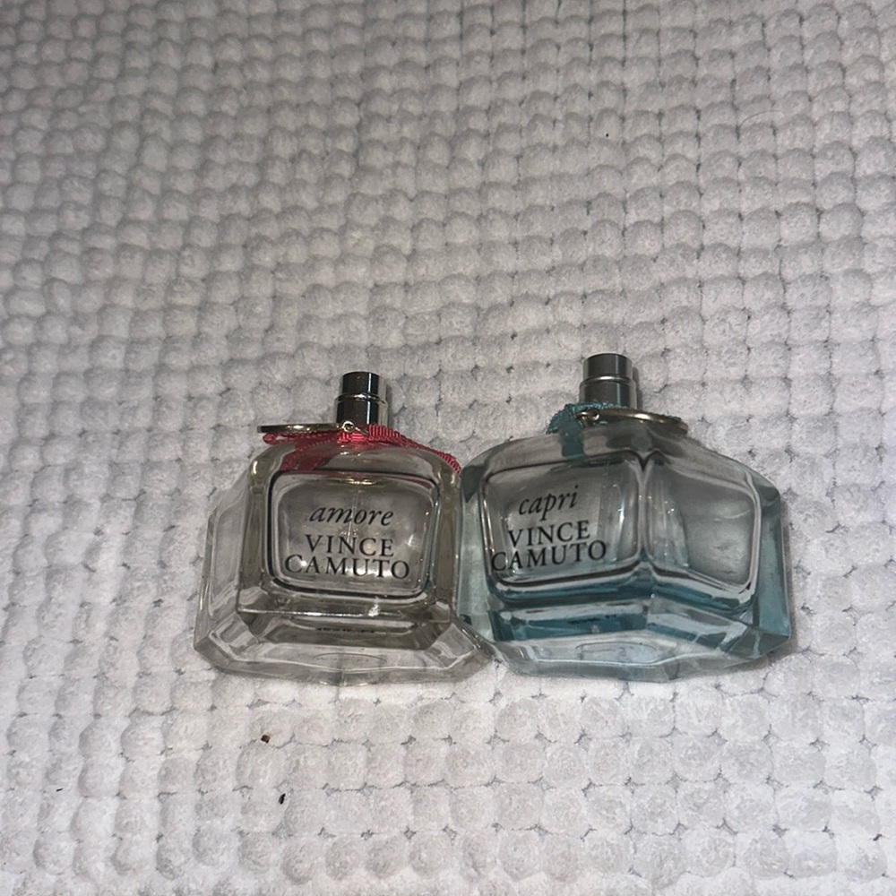 Empty Vince Camuto perfume bottles